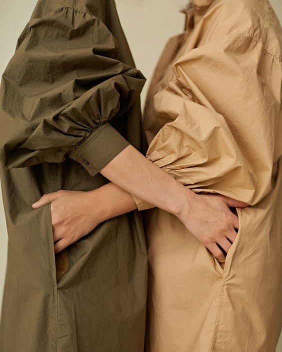 Two shirts in camel and olive